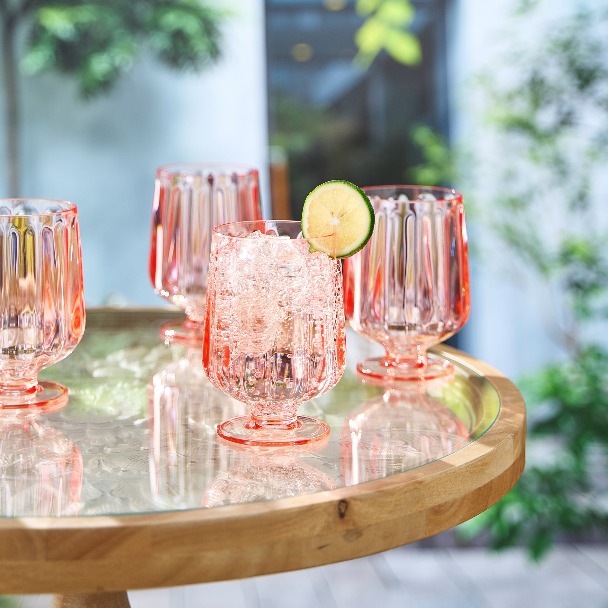 Outdoor entertaining with Madrid acrylic goblets by the pool