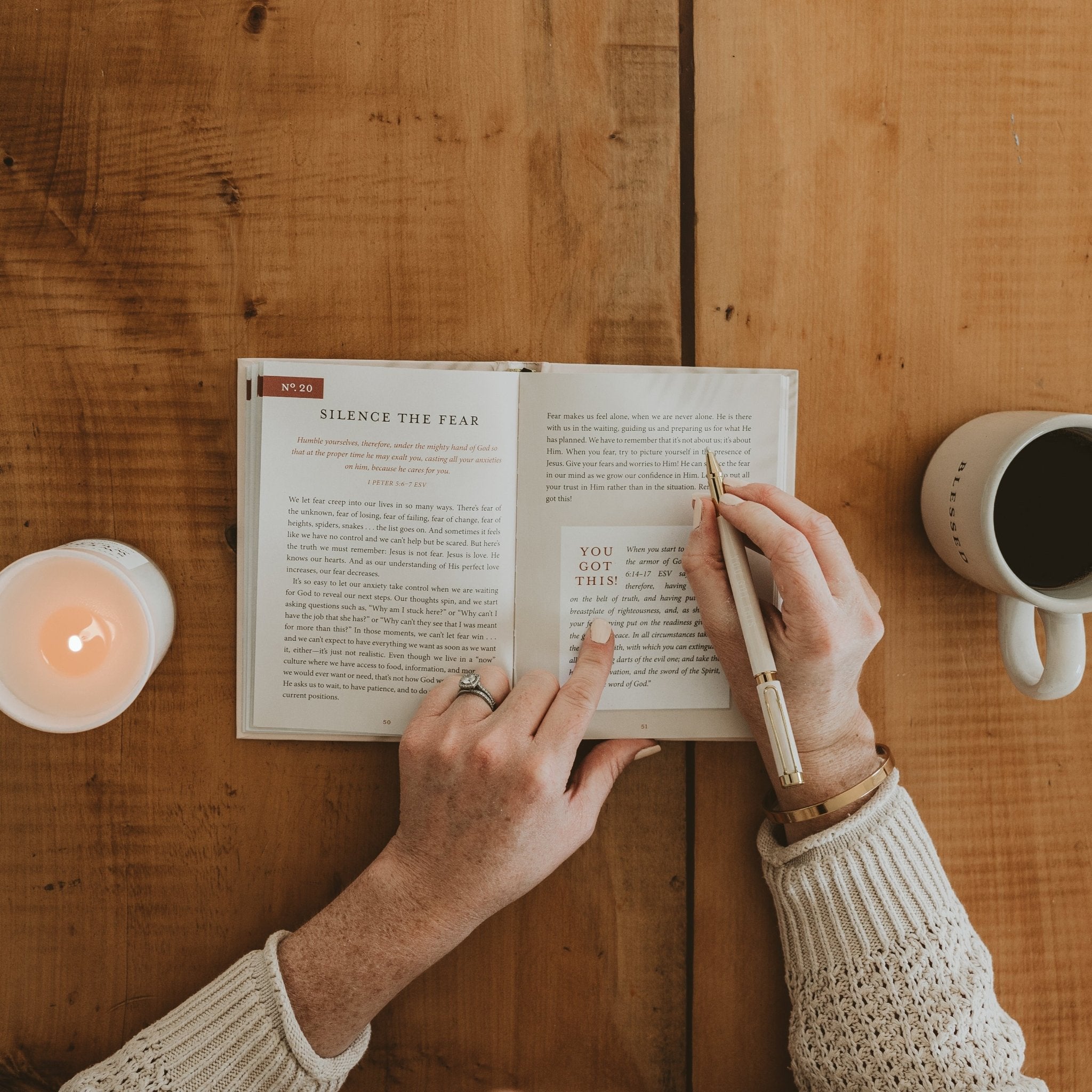 Faith-based encouragement book styled with journal and pen