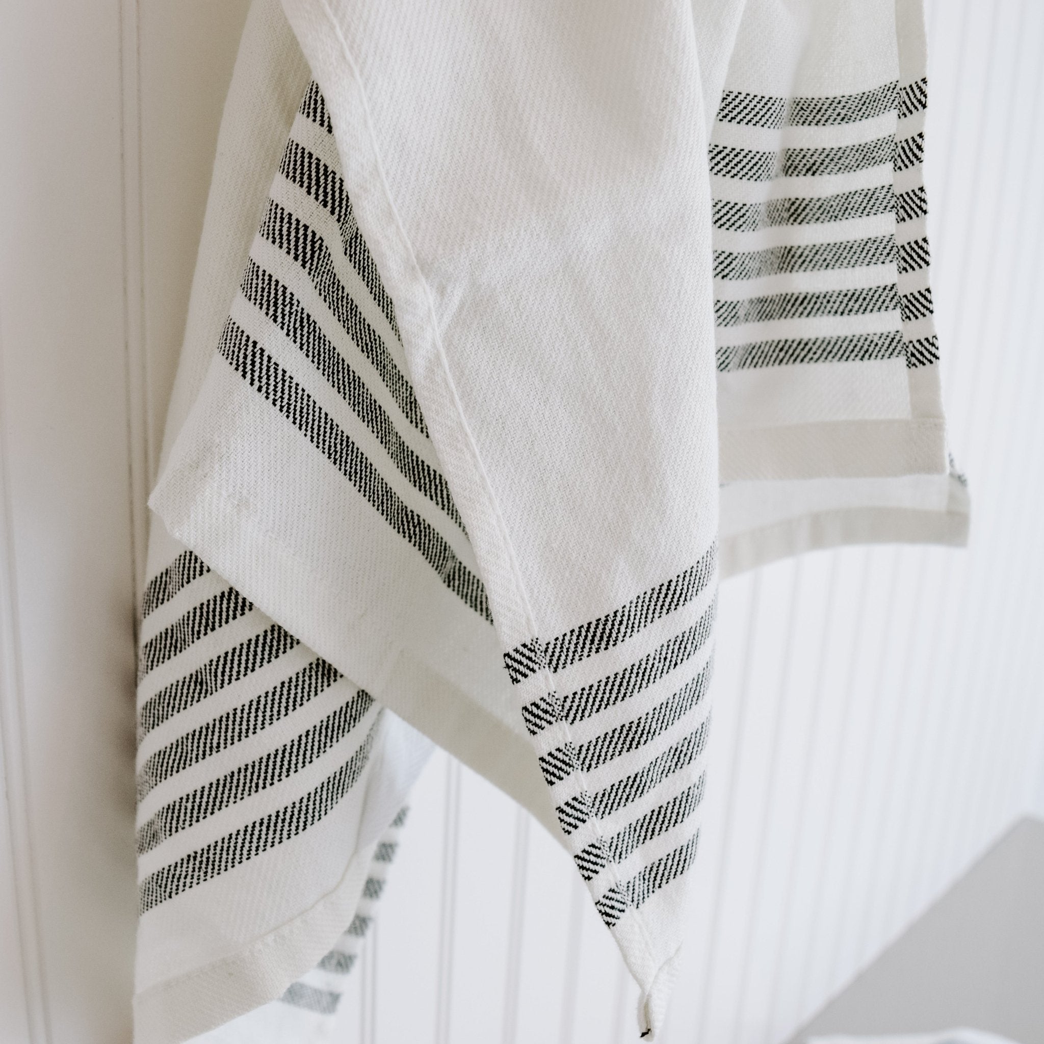 Sweet Water Decor striped tea towel styled in farmhouse kitchen