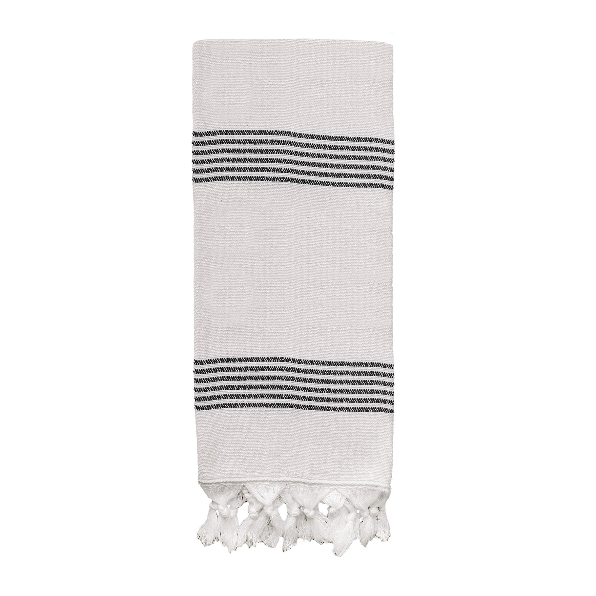 Turkish cotton + bamboo hand towel with multi black stripes draped in bathroom
