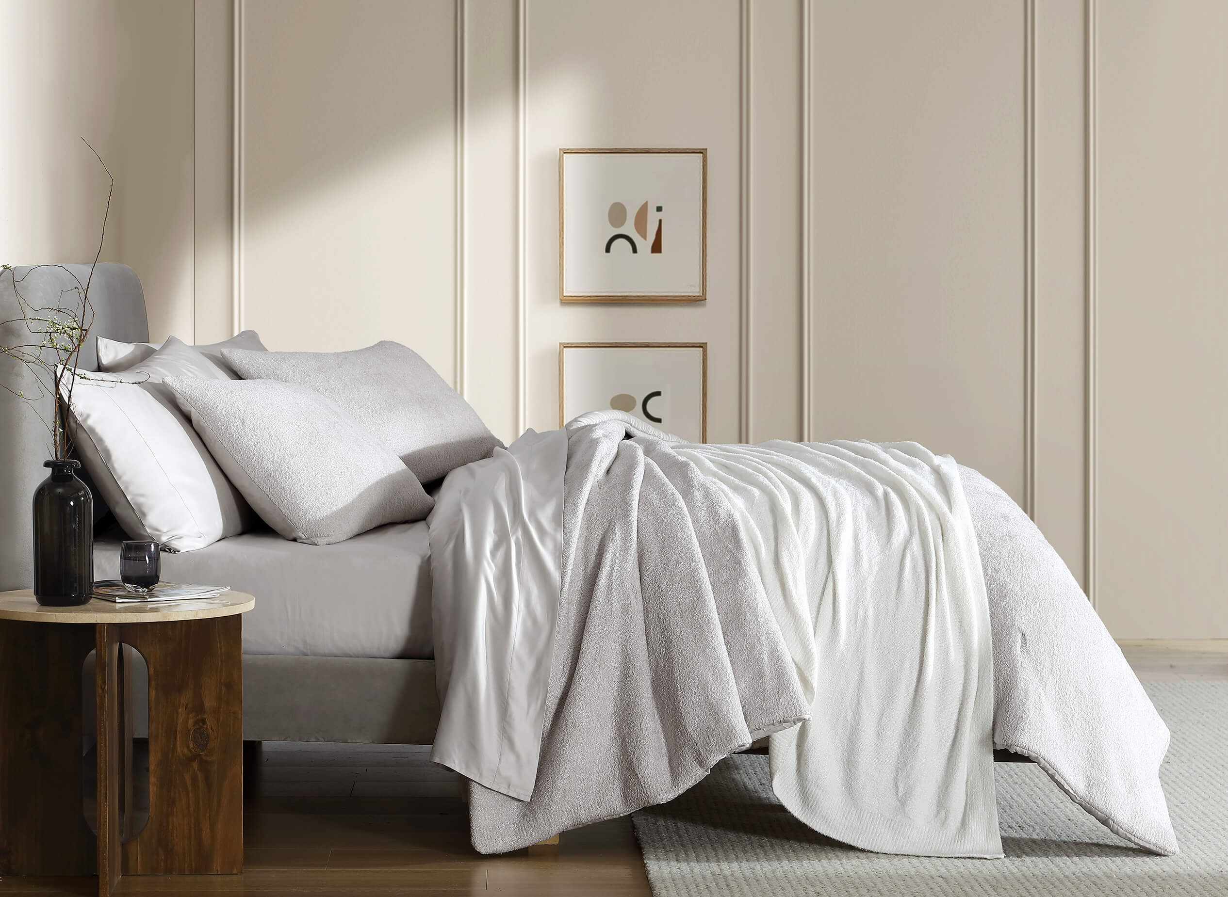 Layered Cloud Silque Bed Blanket styled with neutral bedding