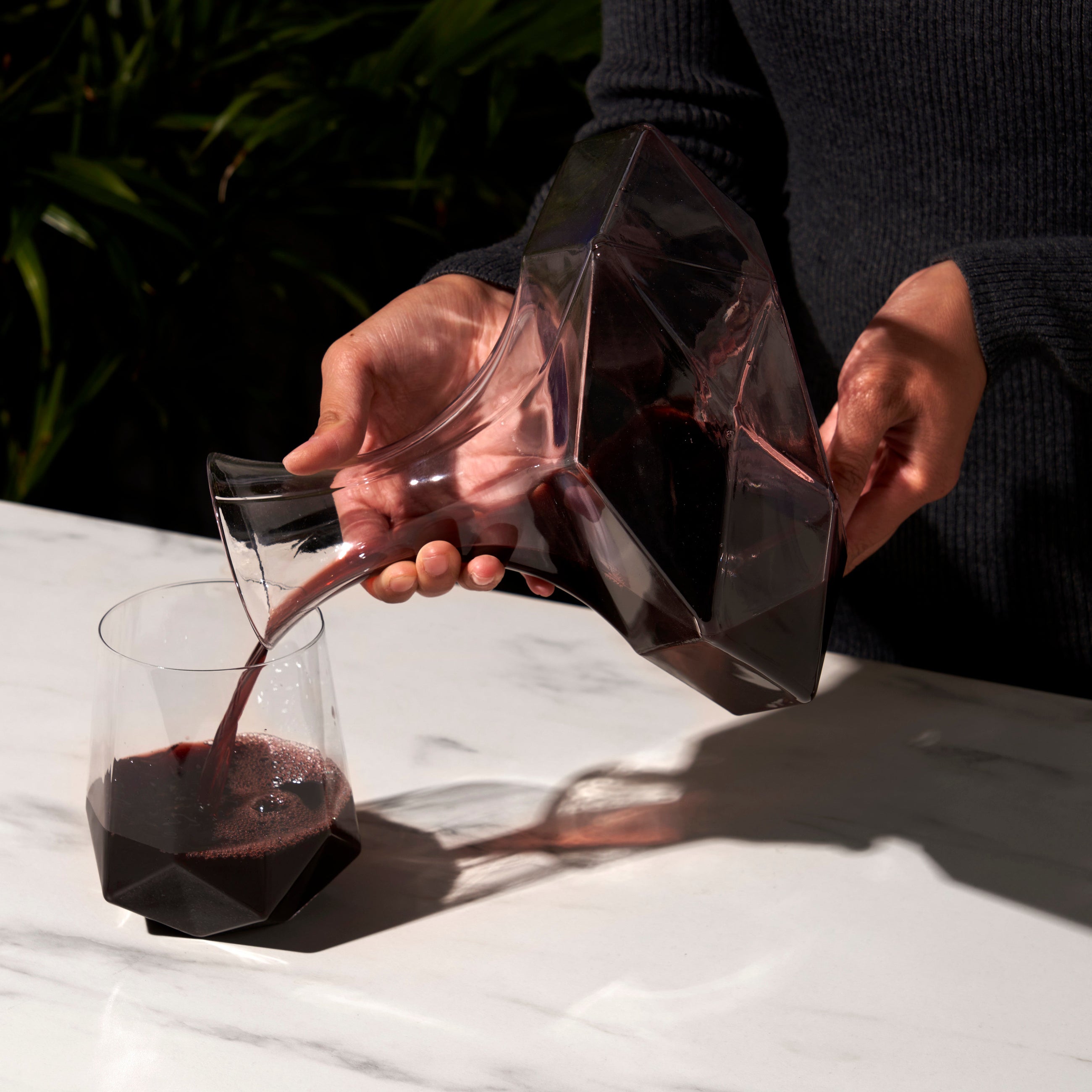 Lead-free crystal decanter filled with red wine