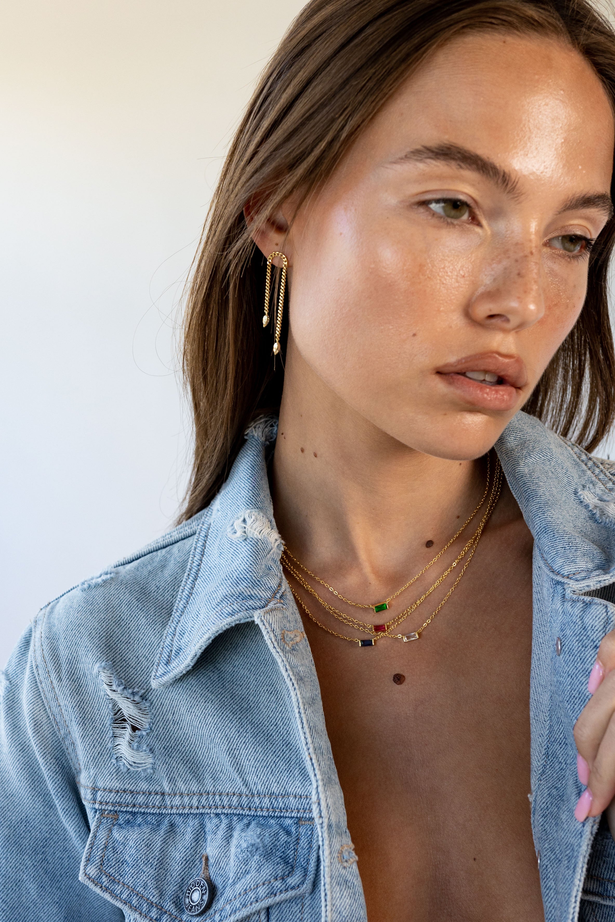 Delicate gold-plated Willow Necklace styled on neckline