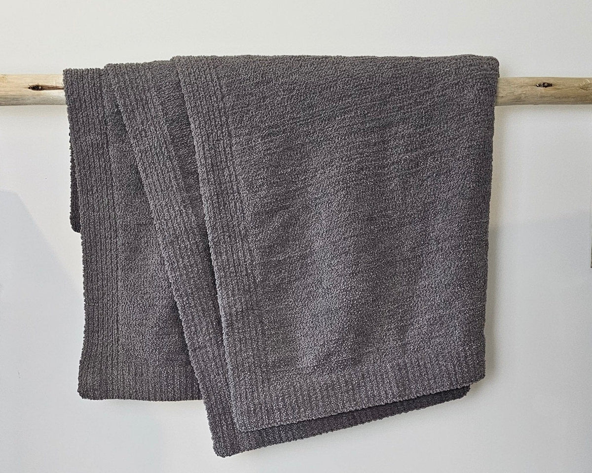 The Nest microfiber throw blanket in Charcoal