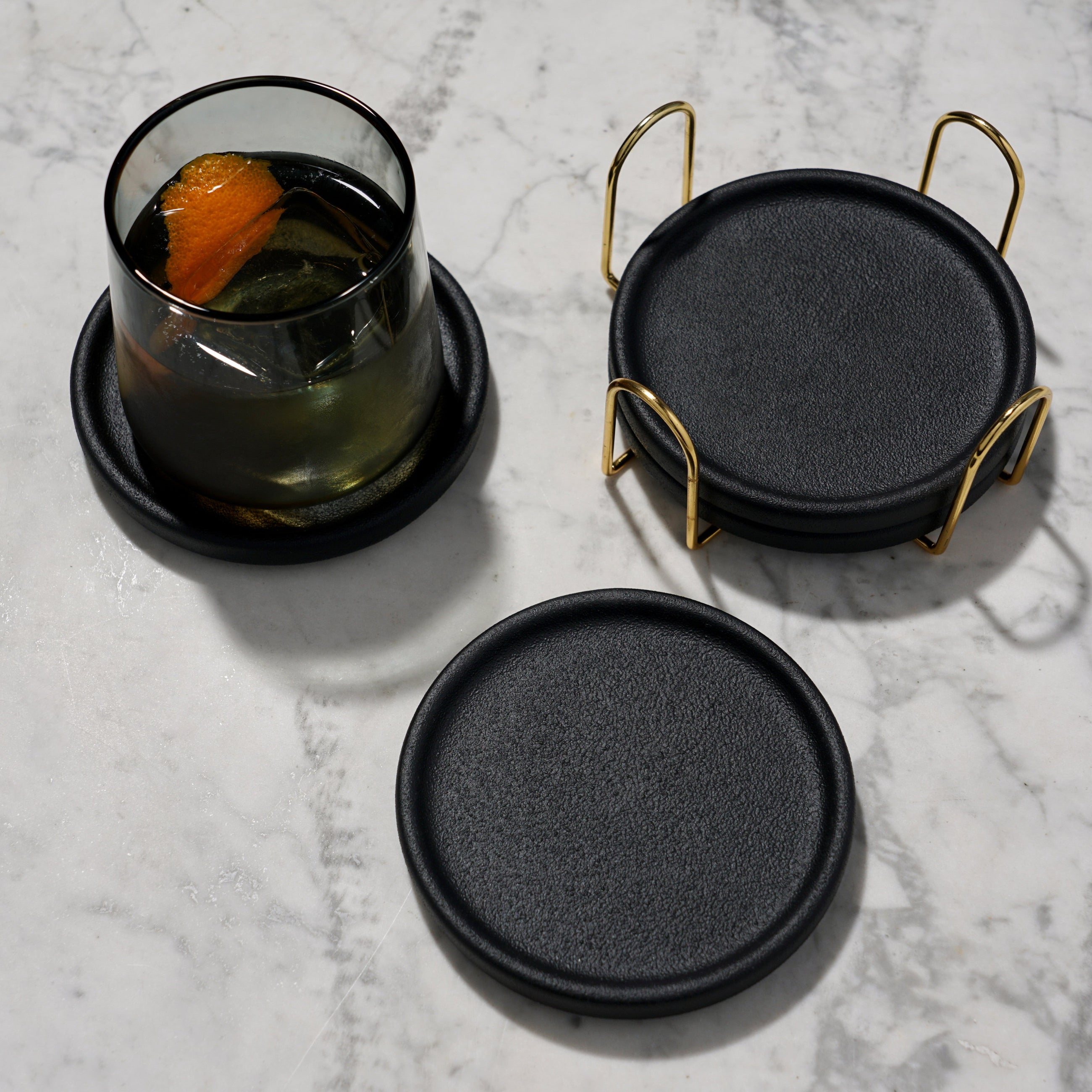 Modern coaster set of 4 with raised rims by Viski