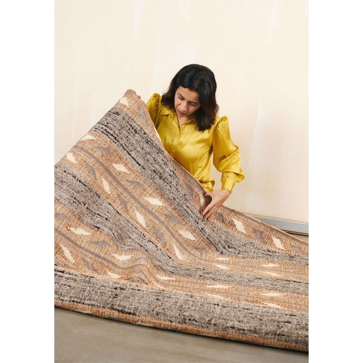 Uneven Arrows handwoven wool jute rug 5x8 in earthy hues – One Affirmation