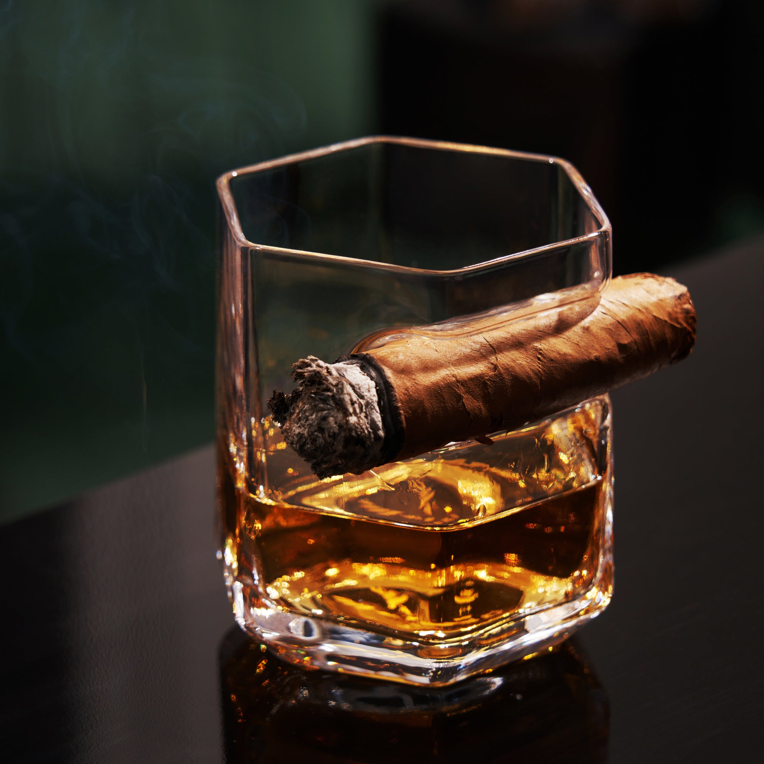 Luxury cigar and whiskey tumbler in clear crystal