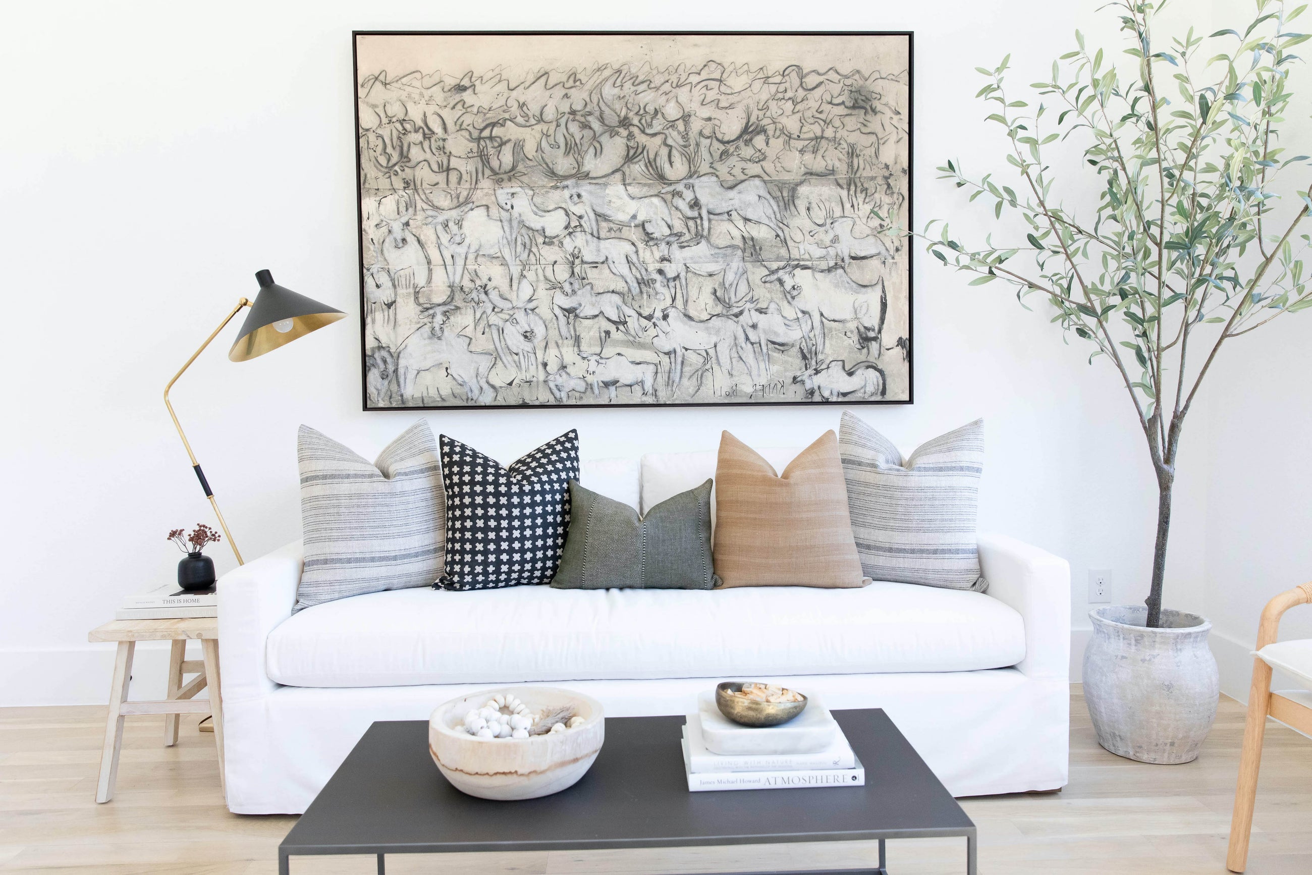 White couch with the Kristina Pillow Set