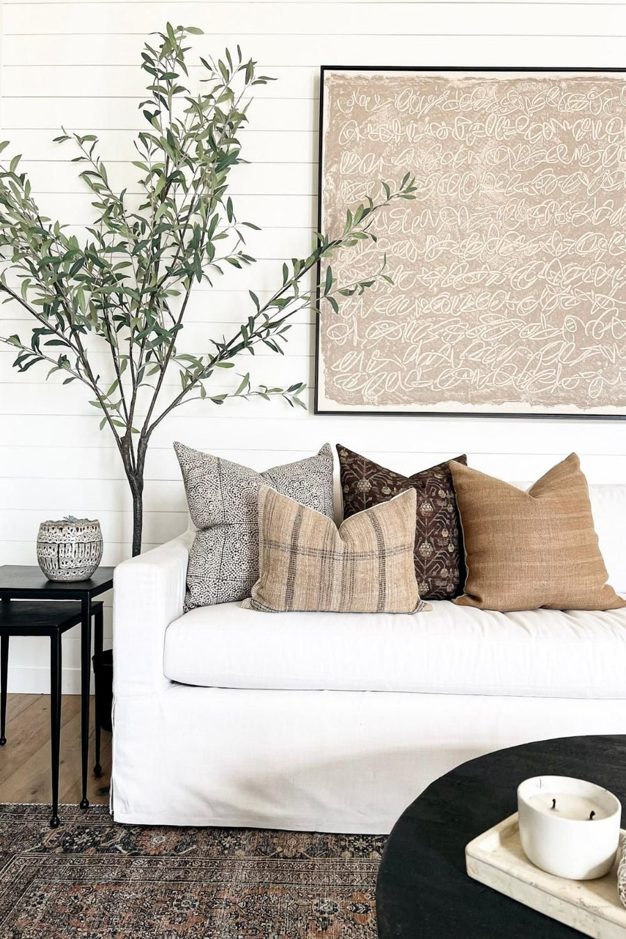 very astatic room with cream colored chairs 