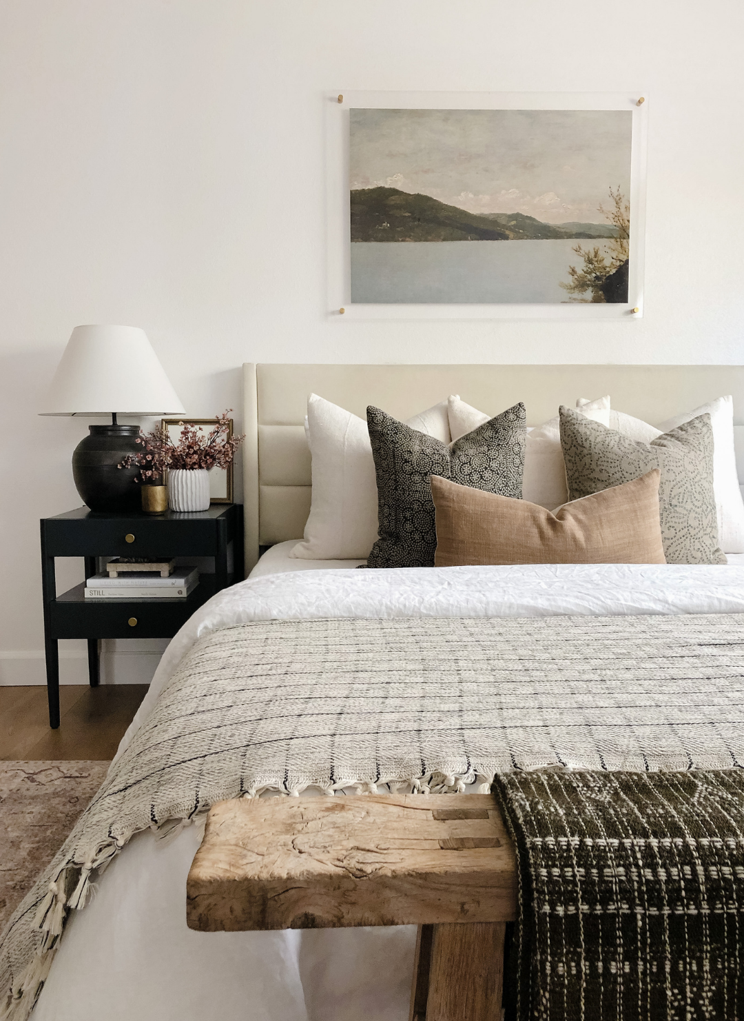 Throw pillow set resting on a bed