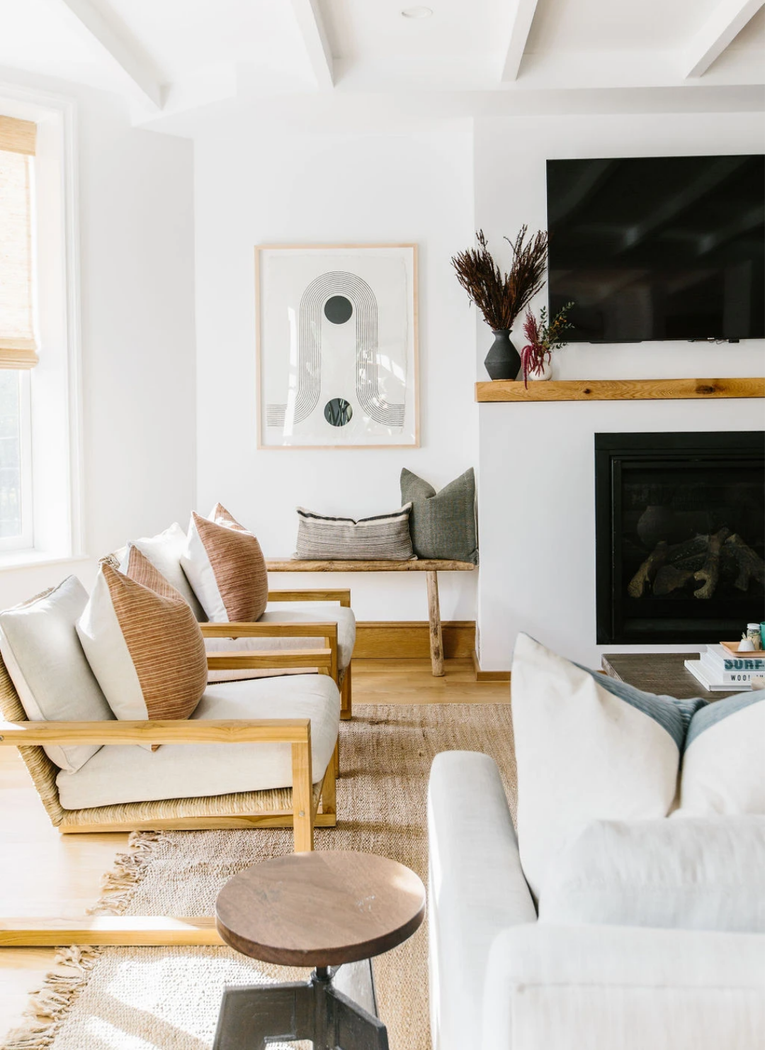 Throw pillows resting on chairs in a living room