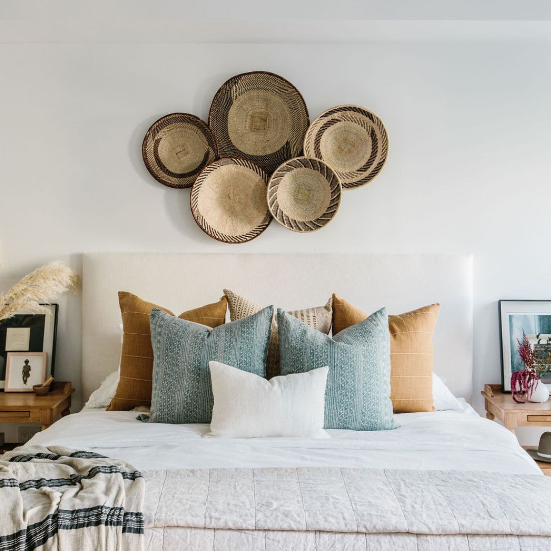 5 layered pillows on a king bed