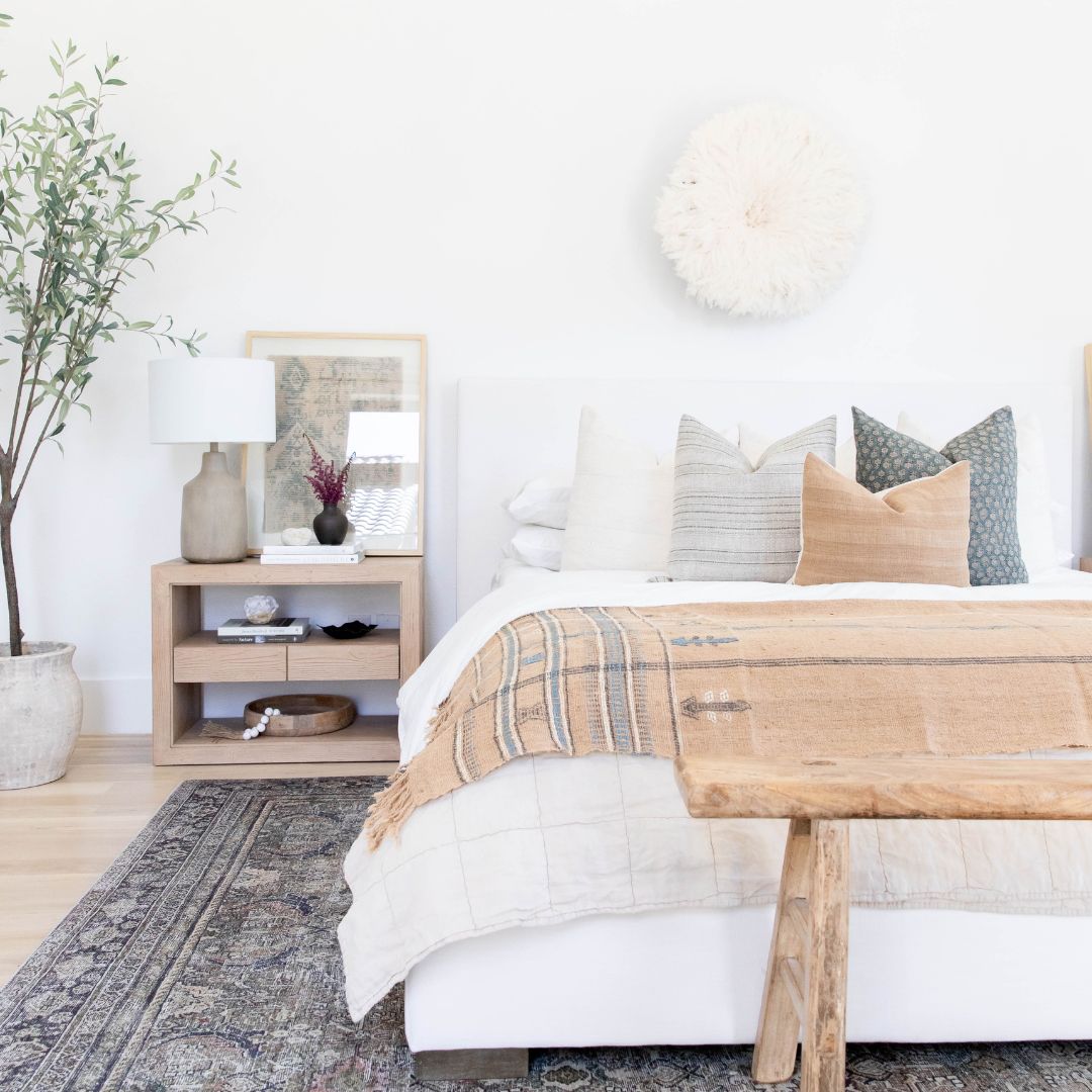 4 Tips for Tastefully Styling Your Bed With Throw Pillows - Design