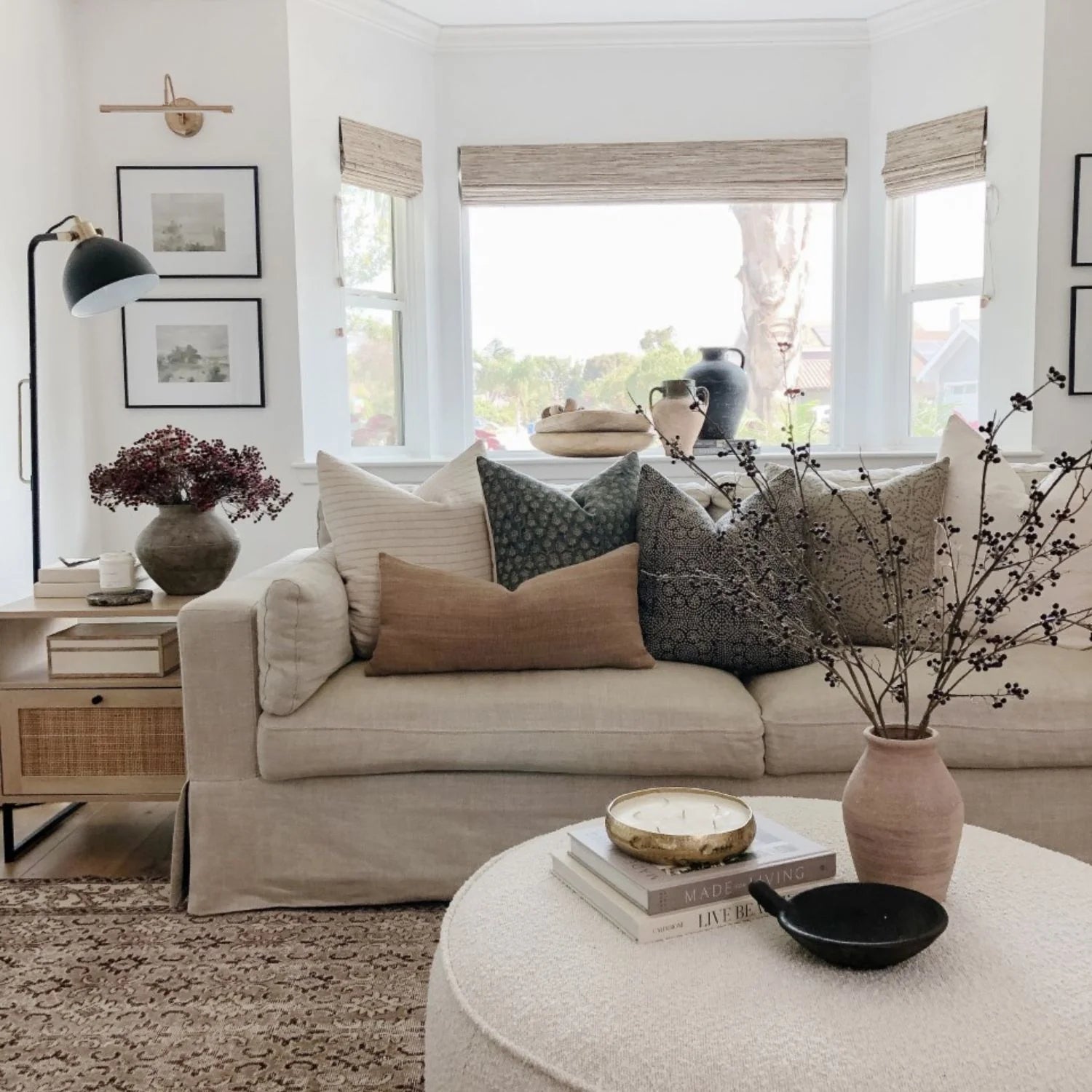 rustic pillows on tan couch