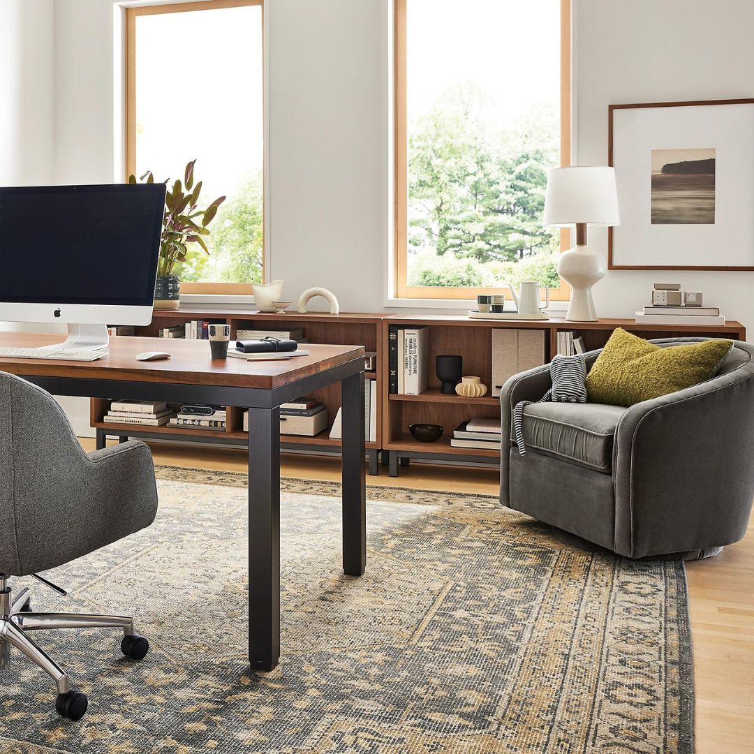home office with grey chair and yellow pillow