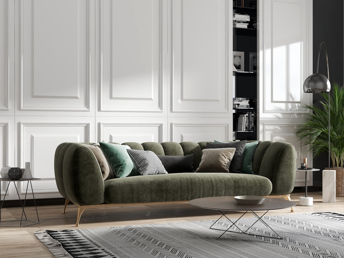 hot to layer throw pillows with different textures on a neutral sofa