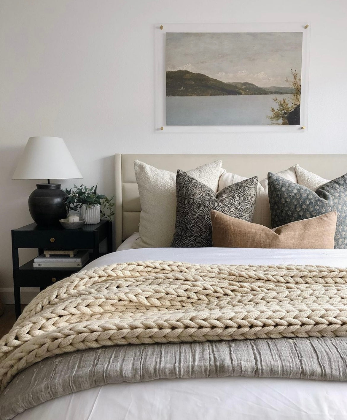 tan wool blankets on white bed