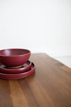 Artisan pottery dinner plate with natural variation