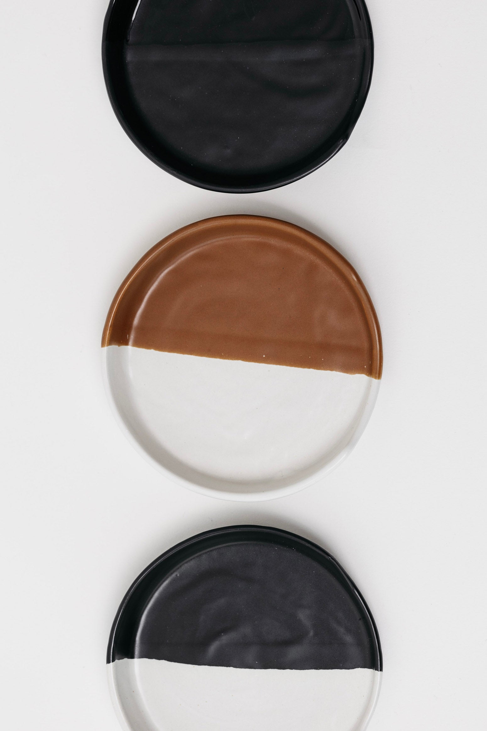 Black and white stoneware spoon rest for cooking