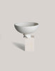 Small white porcelain bowl with sculptural foot