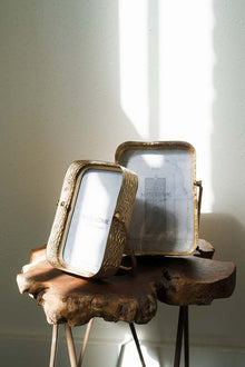 Artisan-made embossed iron frame with tabletop stand