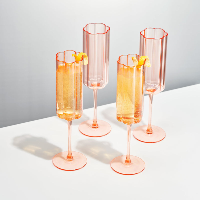 Tall champagne flute filled with sparkling wine