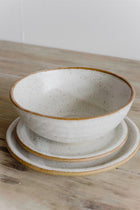 Container with Pottery Plates