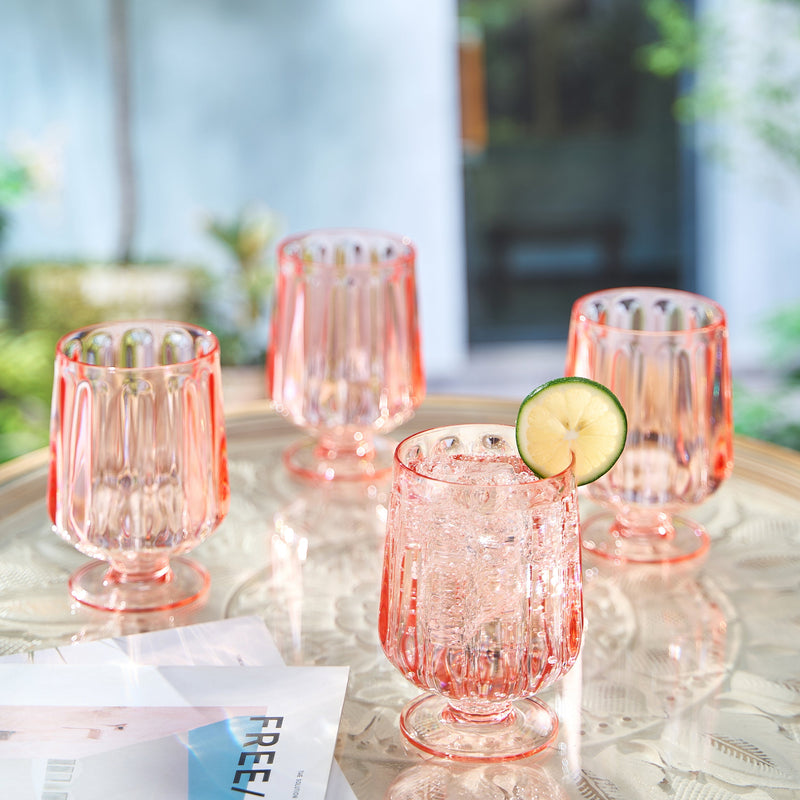 Clear acrylic wine goblet filled with red wine