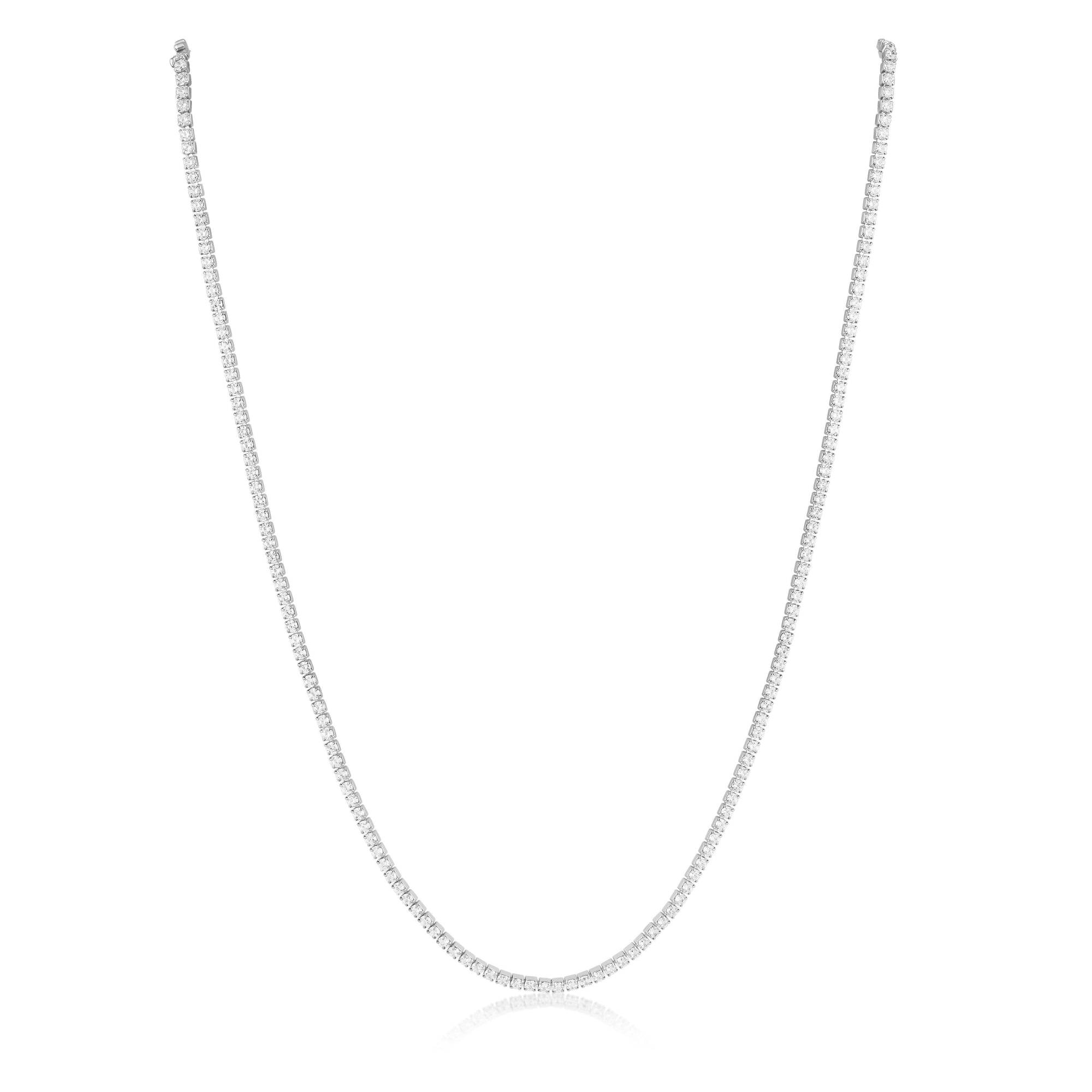 Dainty CZ choker layered with gold chain necklaces