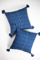 Pair of 20x20 Antigua pillows in natural indigo stripe