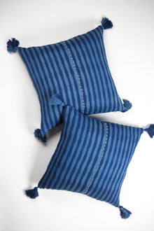 Pair of 20x20 Antigua pillows in natural indigo stripe