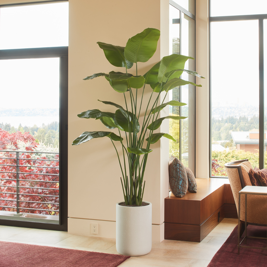 Artificial tropical tree centerpiece in sleek gray pot