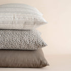 Blue and neutral pillow set featuring the Camille pillow