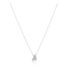 Model wearing Susie Heart Necklace layered with chains