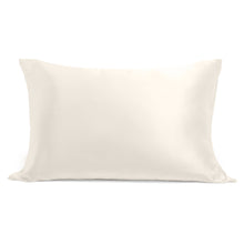 100% silk pillowcase in soft neutral tone styled on bed