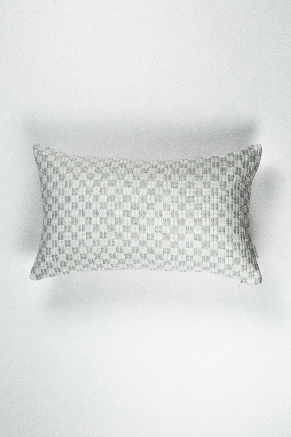 Checkered brocade pillow in grey and white, handwoven in Guatemala