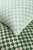 Checkered brocade pillow in grey and white, detail