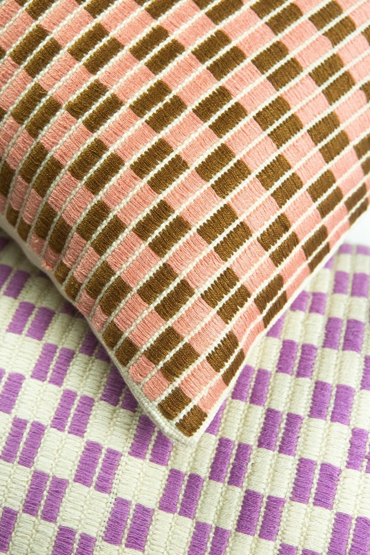 Checkered brocade pillow in pink and umber, handwoven in Guatemala