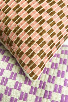 Checkered brocade pillow in pink and umber, handwoven in Guatemala
