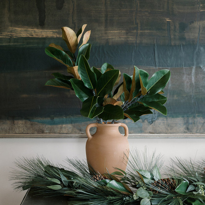 Rustic terracotta vase with side handles for flowers or decor