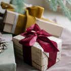 Luxurious red velvet ribbon for holiday gift wrapping