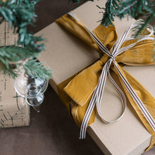 Neutral grosgrain ribbon for holiday gift wrapping