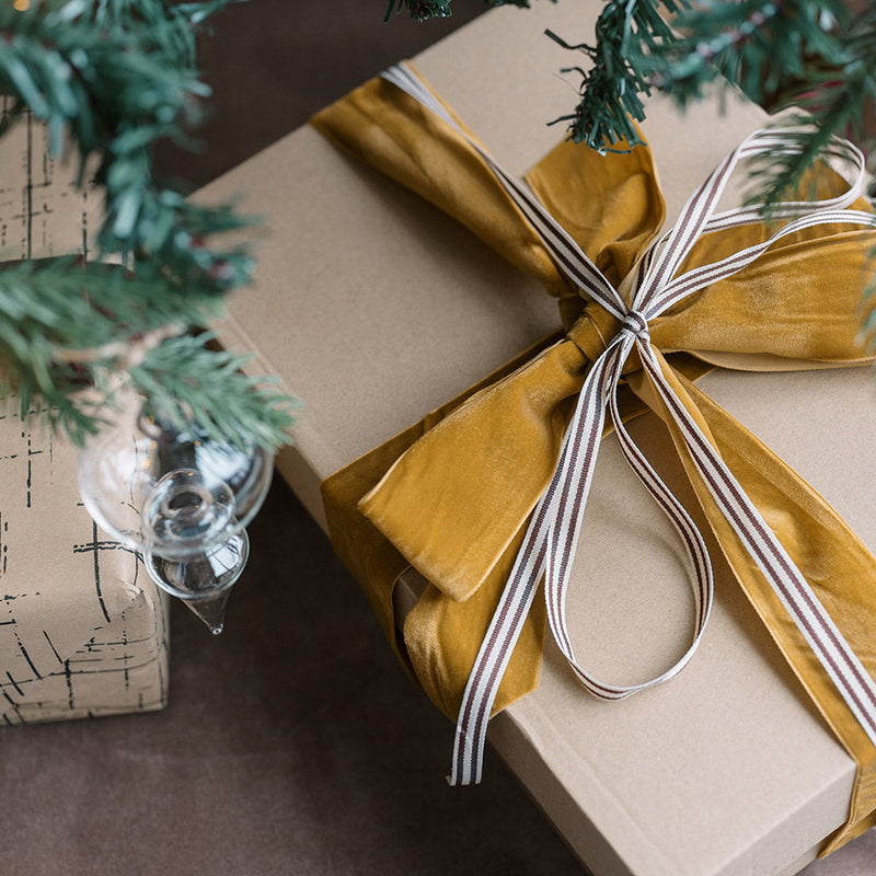 Neutral grosgrain ribbon for holiday gift wrapping