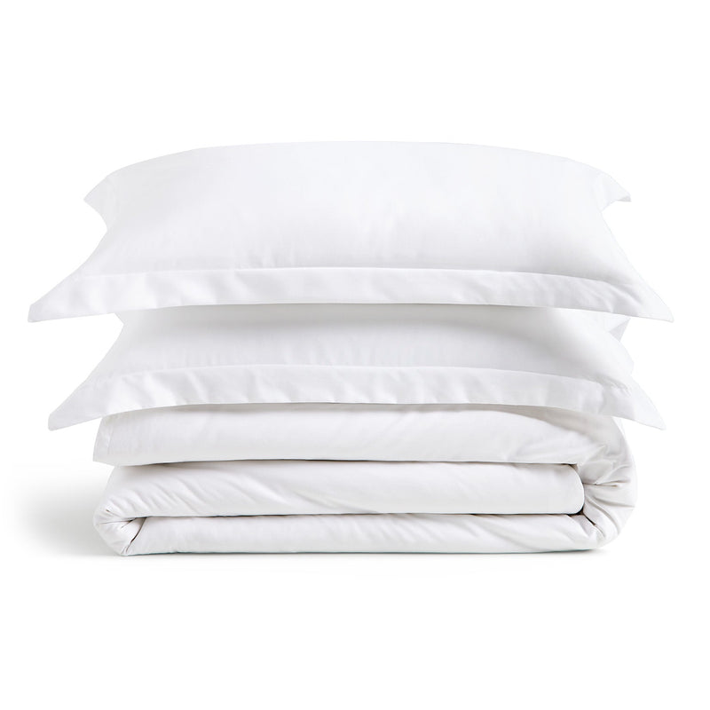 Luxury bamboo blend duvet cover set on bed with shams