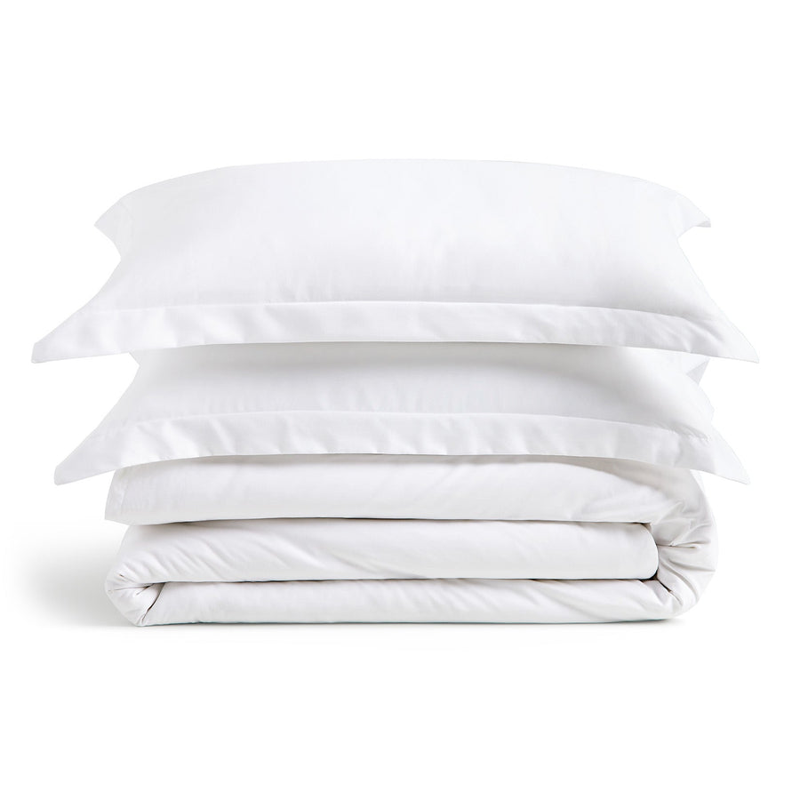 Luxury bamboo blend duvet cover set on bed with shams