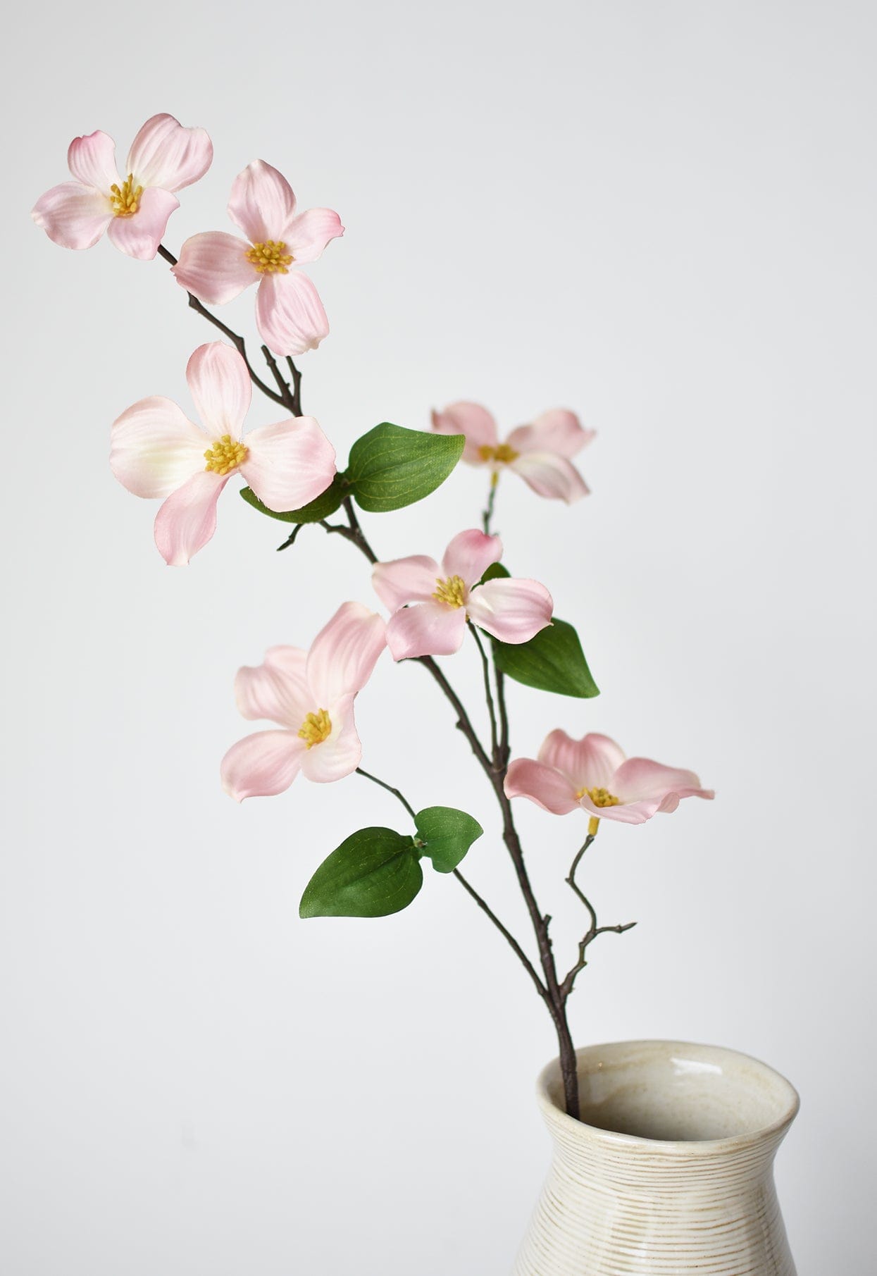 Artificial spring dogwood branch for floral arrangements