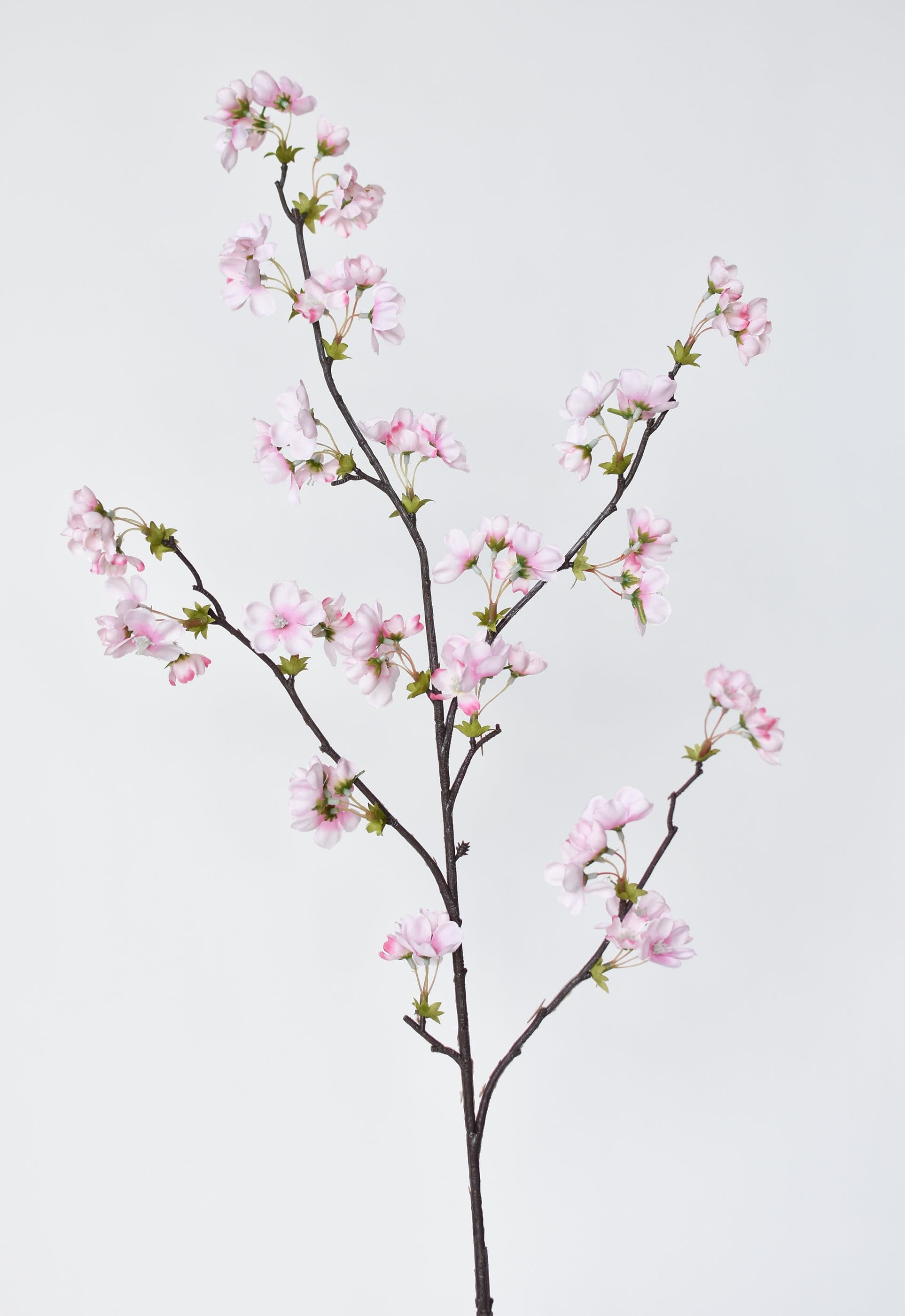 Artificial pink quince flowering branch with 50 blossoms
