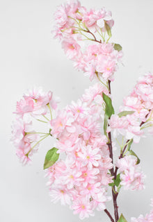 Artificial pink cherry blossom flowering branch for tall vases