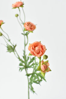 Artificial peach ranunculus stem with delicate blooms