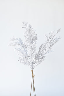 Set of 3 flocked artificial twigs resembling frosted branches